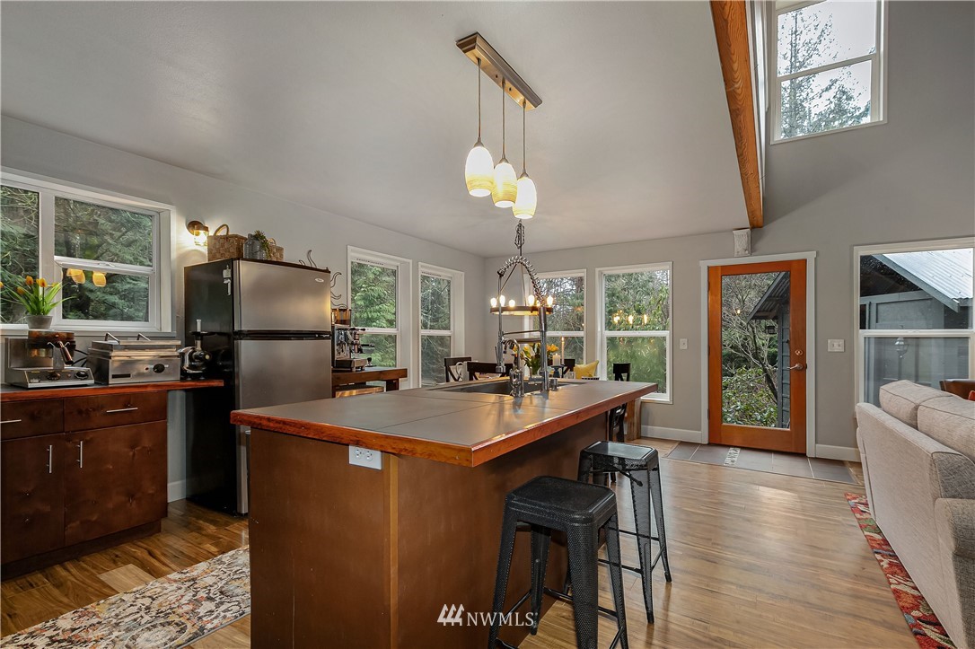 467 Cove Road Bellingham, WA 98229 - Photo 16 of 40 a kitchen with sink and refrigerator
