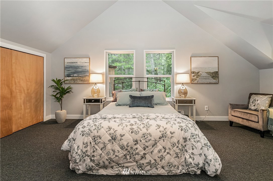 467 Cove Road Bellingham, WA 98229 - Photo 17 of 40 a bedroom with a bed and window