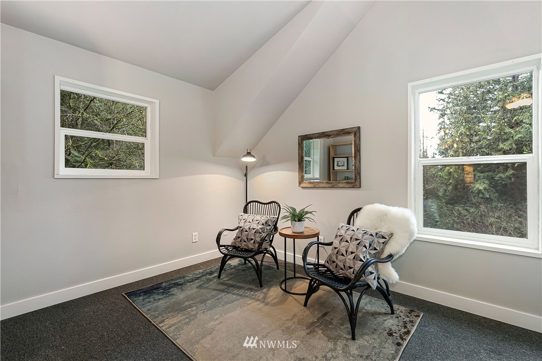 467 Cove Road Bellingham, WA 98229 - Photo 22 of 40 a living room with furniture and a window