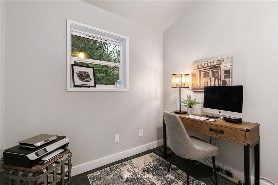 467 Cove Road Bellingham, WA 98229 - Photo 25 of 40 a view of a workspace with furniture and a window