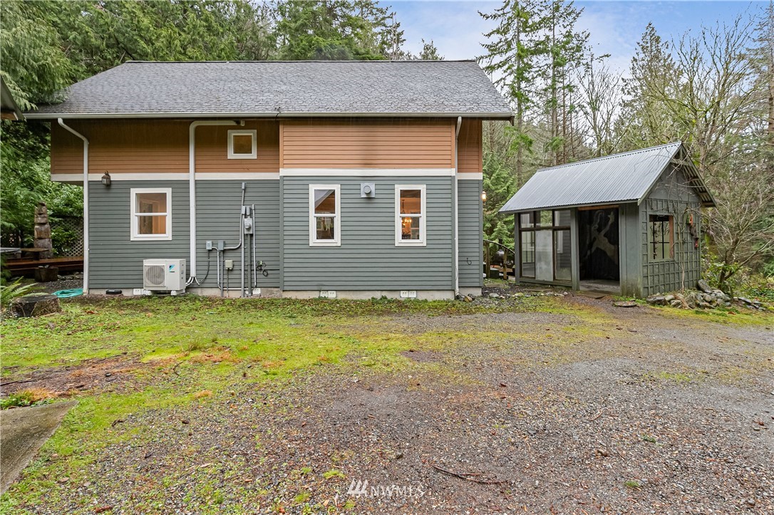 467 Cove Road Bellingham, WA 98229 - Photo 32 of 40 a front view of a house with garden