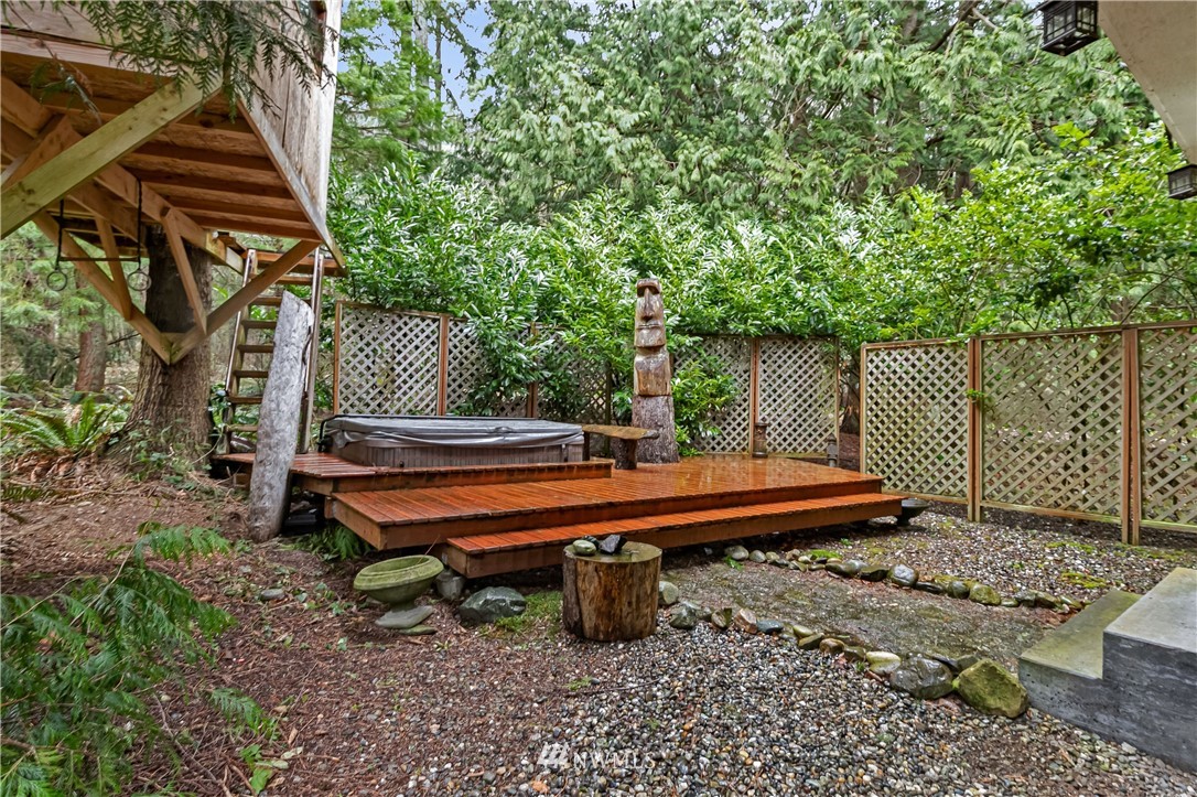 467 Cove Road Bellingham, WA 98229 - Photo 5 of 40 a backyard of a house with table and chairs