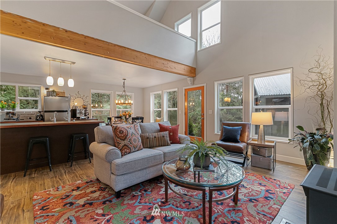 467 Cove Road Bellingham, WA 98229 - Photo 8 of 40 a living room with furniture and a dining table