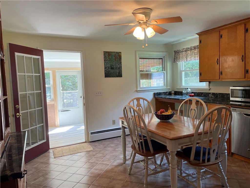 371 Weaver Hill Road Coventry, RI 02816 - Photo 8 of 28 From Sunroom walk into open eat in kitchen
