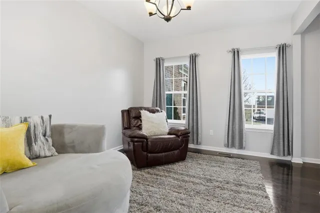 a living room with furniture and a couch