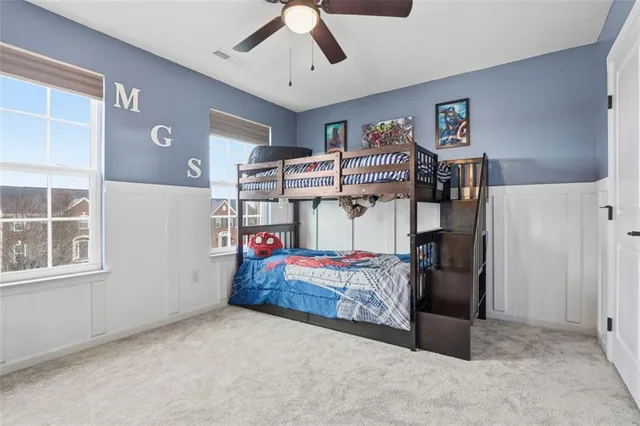 a bed room with a bed and furniture