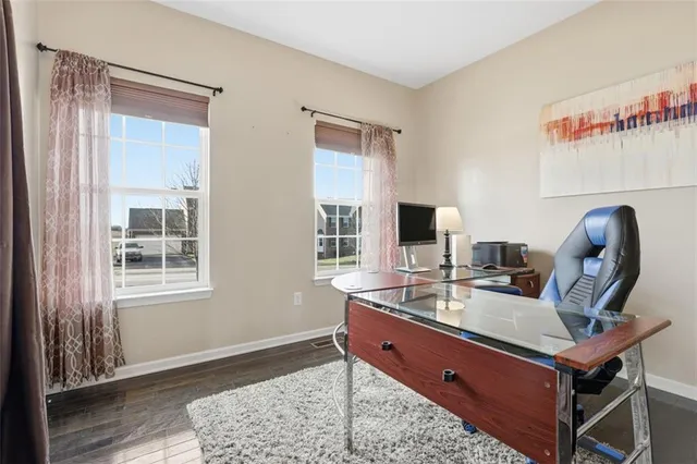 a room with furniture and a window