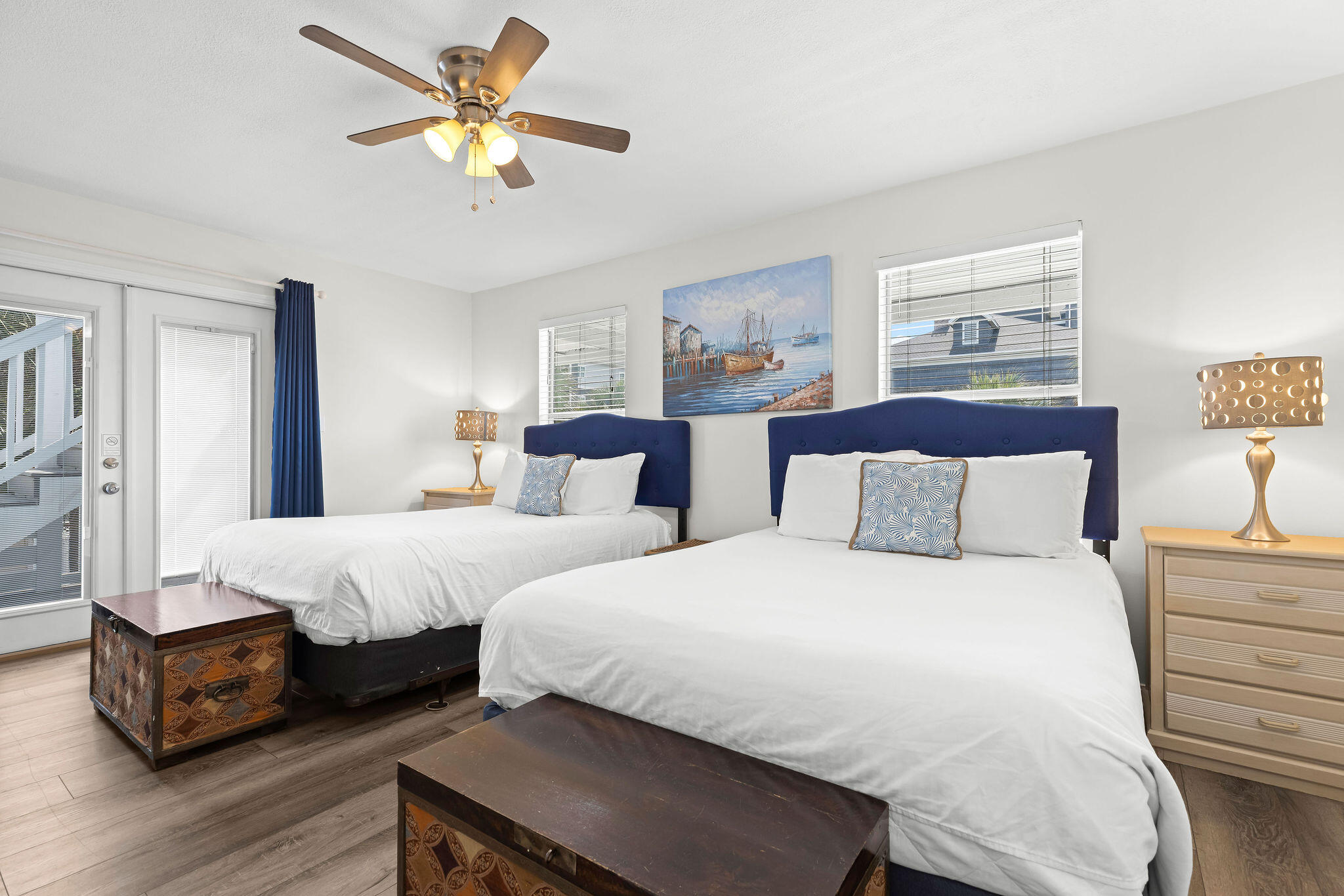 91 Matthew Boulevard Destin, FL 32541 - Photo 67 of 85 a bedroom with two beds and a chandelier
