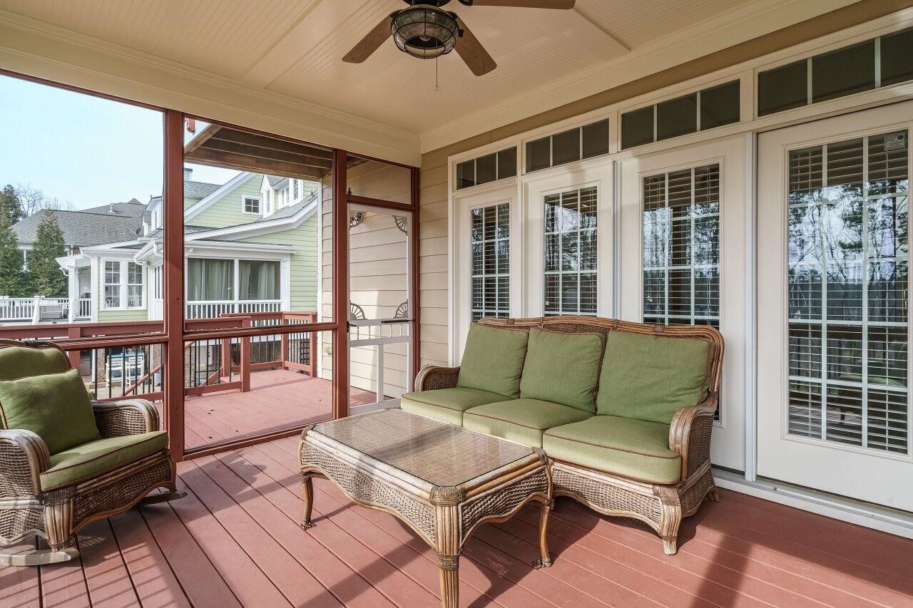 5327 Landguard Drive Raleigh, NC 27613 - Photo 22 of 45 Main level screened in porch with additional area for grilling! Screened in Porch