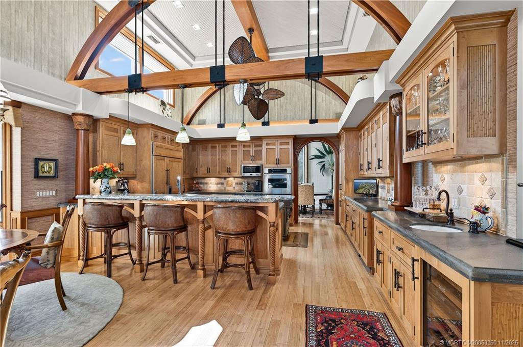 1210 Northwest Winters Creek Road Palm City, FL 34990 - Photo 17 of 73 Magnificent Chefs' Kitchen. Inlayed Bamboo Custom Cabinetry.