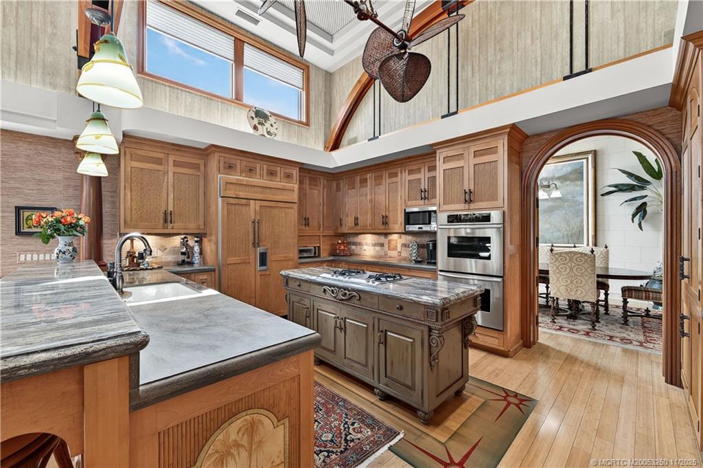 1210 Northwest Winters Creek Road Palm City, FL 34990 - Photo 19 of 73 Honed Marble & Granite Countertops