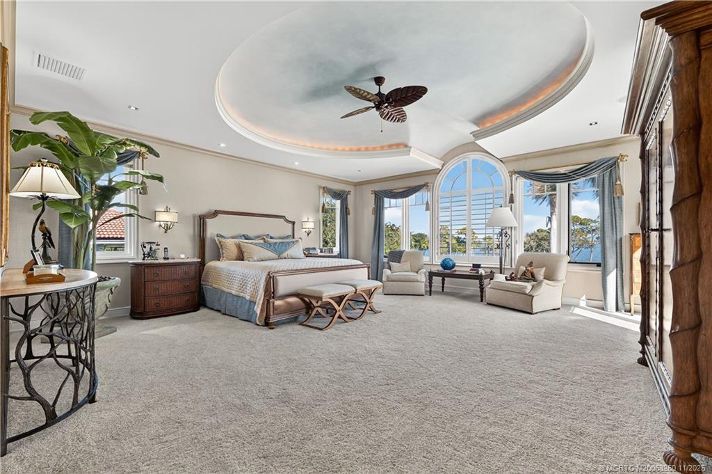 1210 Northwest Winters Creek Road Palm City, FL 34990 - Photo 28 of 73 Primary Suite with magnificent views of the St. Lucie River.