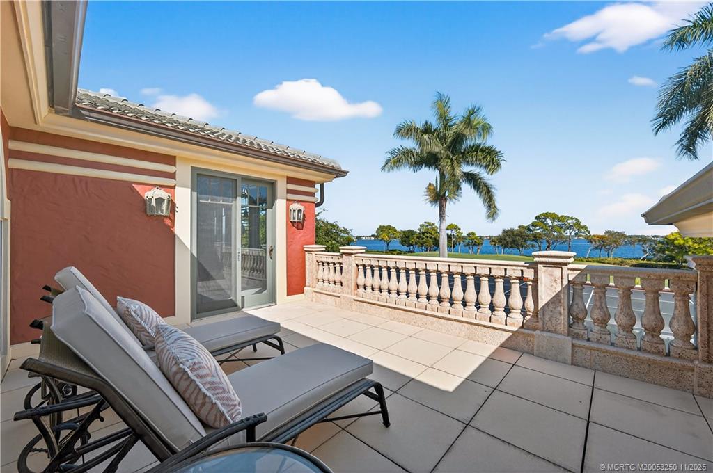 1210 Northwest Winters Creek Road Palm City, FL 34990 - Photo 33 of 73 Sun Deck off Primary Suite with incredible St. Lucie River Views.