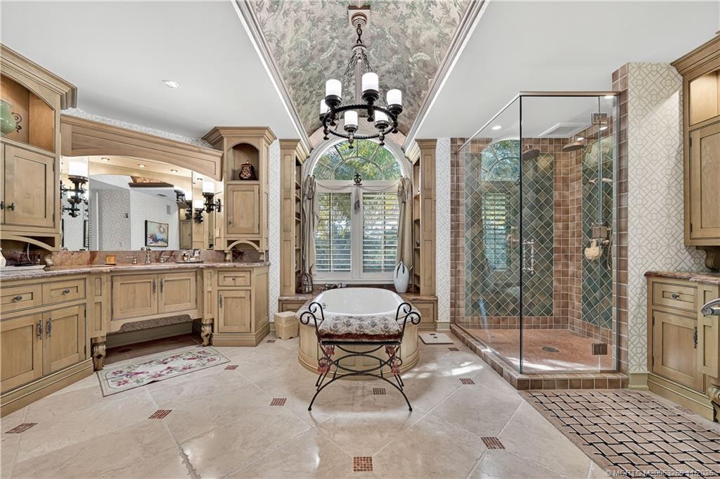 1210 Northwest Winters Creek Road Palm City, FL 34990 - Photo 35 of 73 Primary Bath - Heated Floor - Custom Cabinetry - Finishes that only a private showing can appreciate!