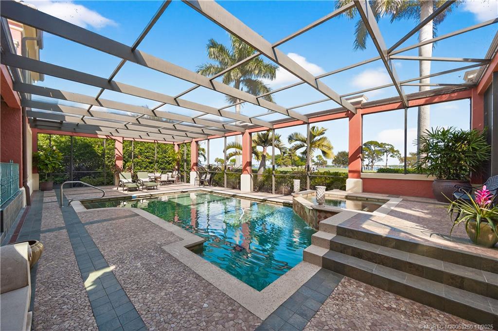 1210 Northwest Winters Creek Road Palm City, FL 34990 - Photo 55 of 73 Large Screen-Enclosed Pool and Patio with Spa
