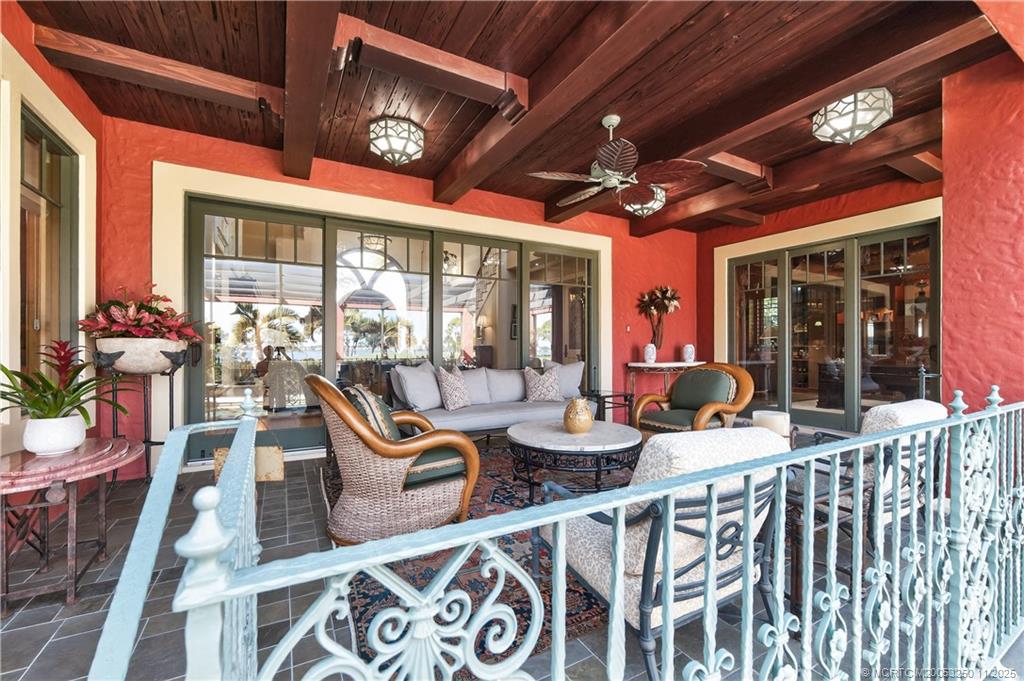 1210 Northwest Winters Creek Road Palm City, FL 34990 - Photo 60 of 73 Covered Patio Sitting Area with Pecky Cypress Ceilings