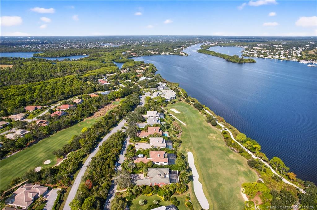 1210 Northwest Winters Creek Road Palm City, FL 34990 - Photo 70 of 73 Exclusive Sand Pine Village in Harbour Ridge Y&CC overlooking Pete Dye #3 Fairway and St. Lucie River