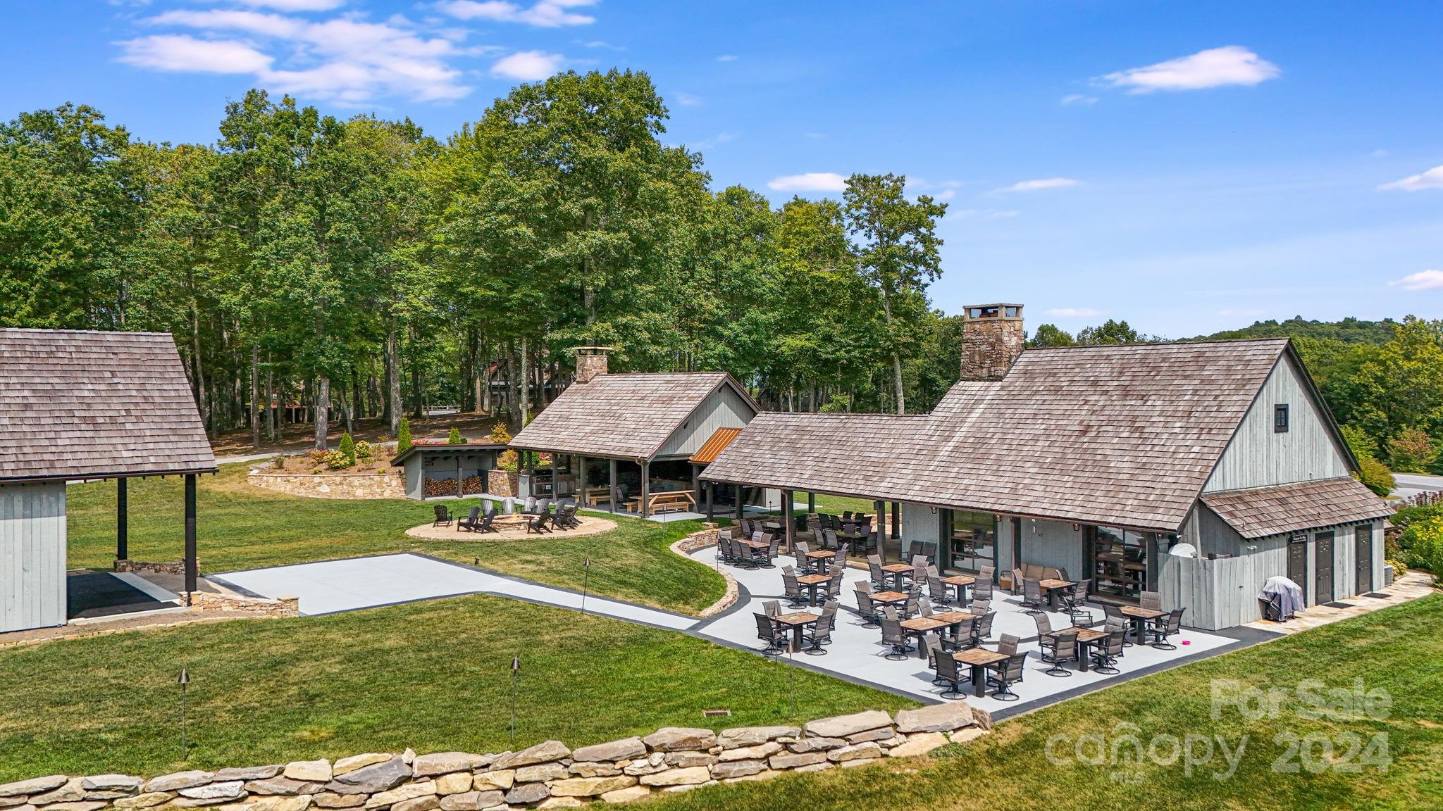 Lot D52 Springwater Road Glenville, NC 28736 - Photo 26 of 47 an aerial view of a house with garden space and street view