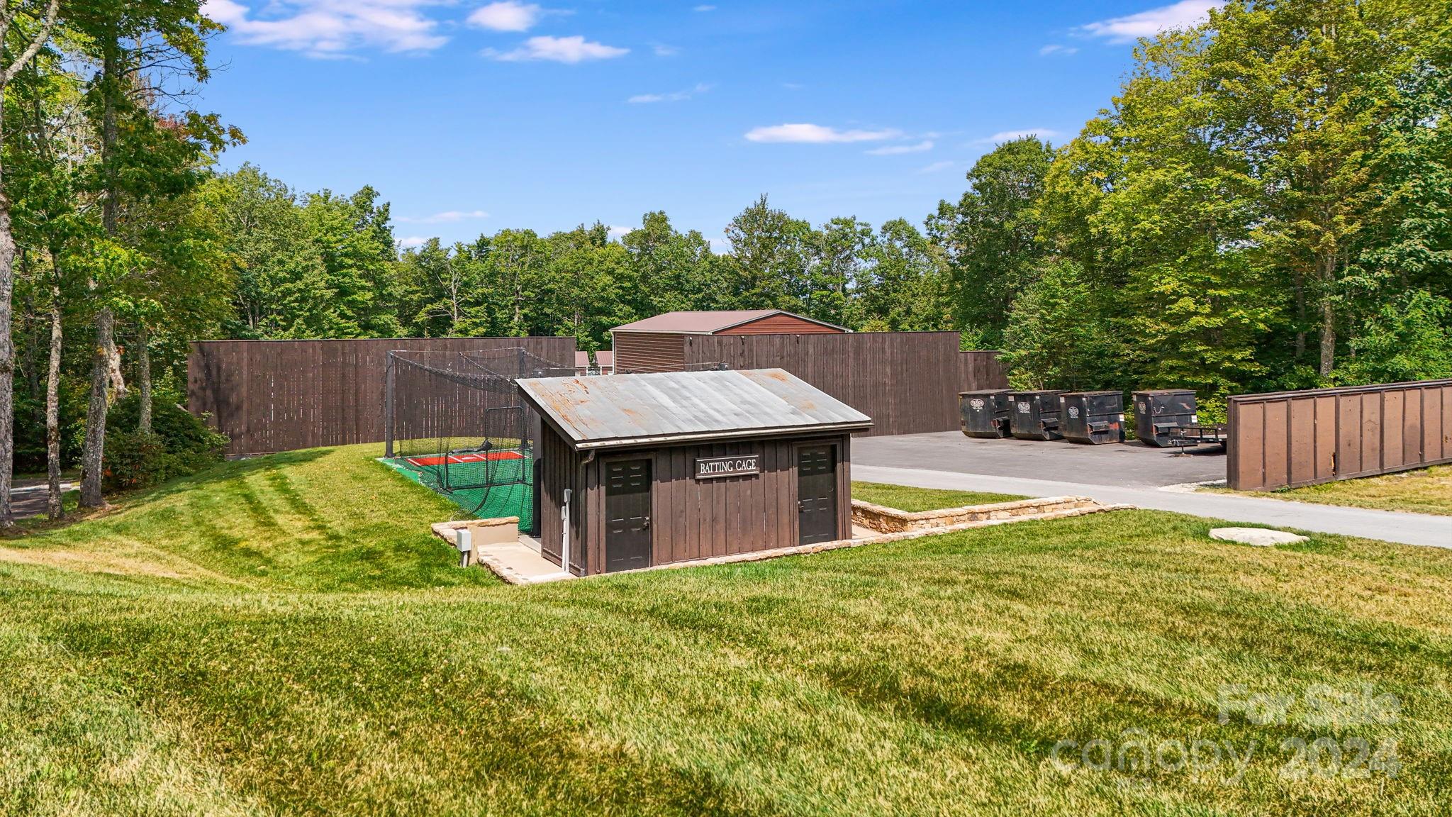 Lot D52 Springwater Road Glenville, NC 28736 - Photo 29 of 47 a view of a backyard with a small cabin
