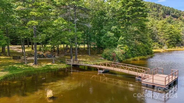 a view of a two chairs on the deck
