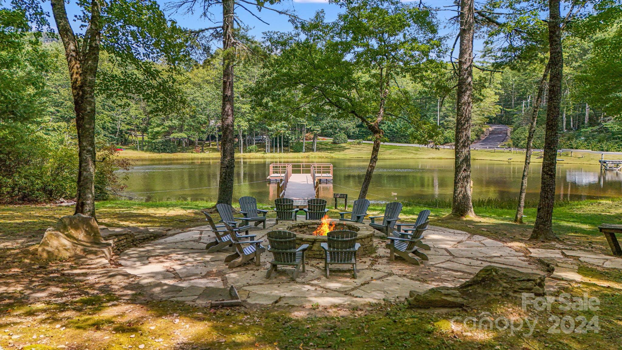 Lot D52 Springwater Road Glenville, NC 28736 - Photo 33 of 47 a view of a lake with a patio