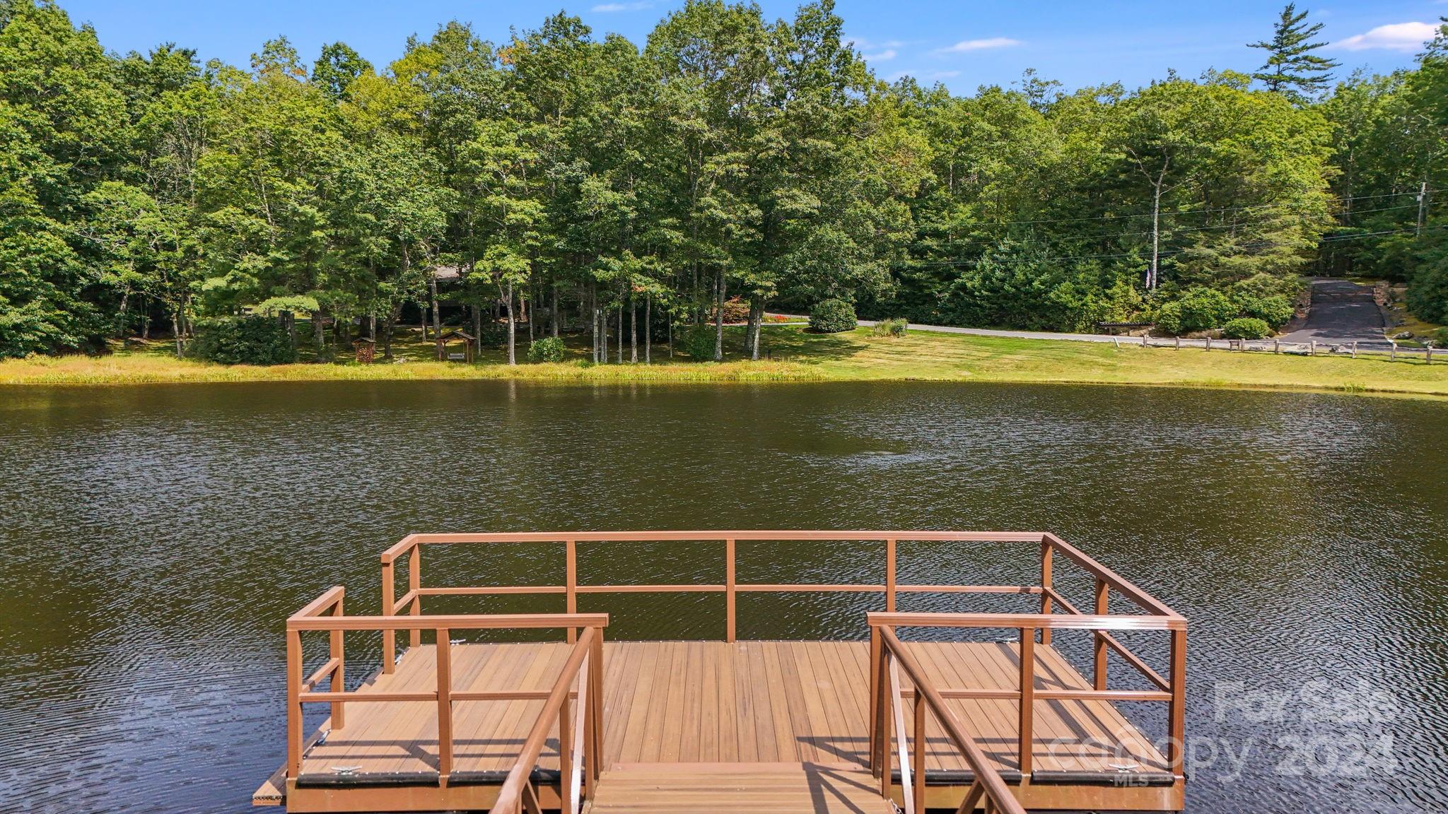 Lot D52 Springwater Road Glenville, NC 28736 - Photo 34 of 47 a view of a two chairs on the deck