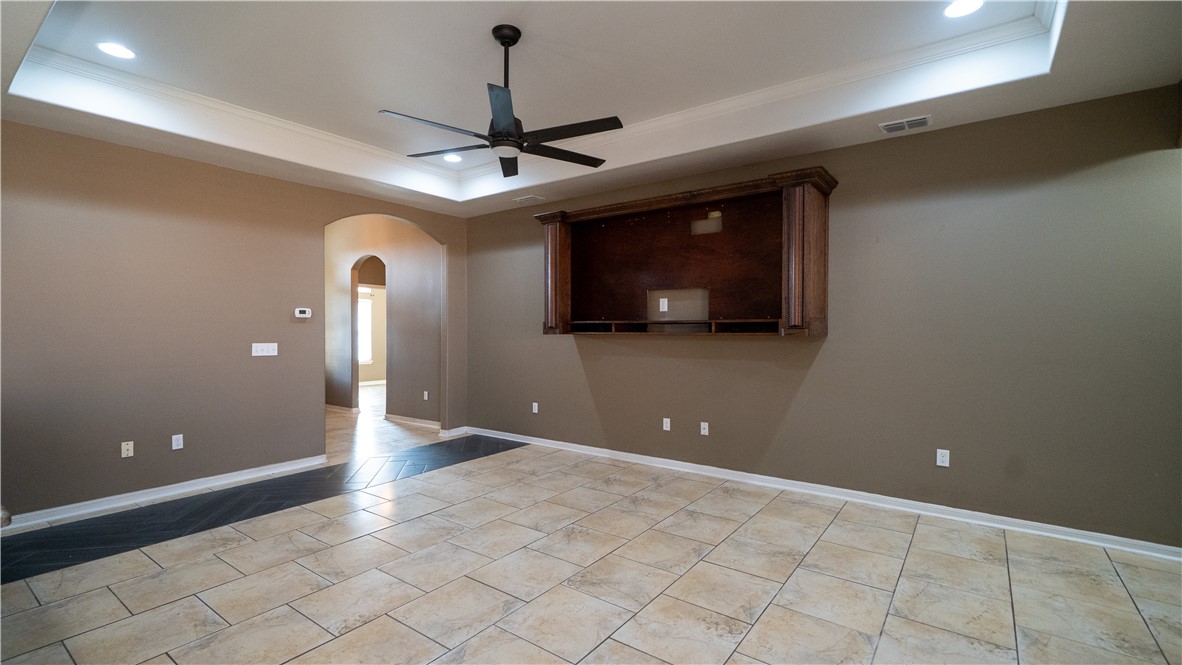 6809 Summer Wind Drive Corpus Christi, TX 78413 - Photo 5 of 27 a view of a livingroom with a flat screen tv