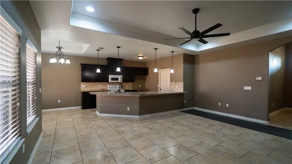 a large bathroom with a large tub shower vanity and a sink