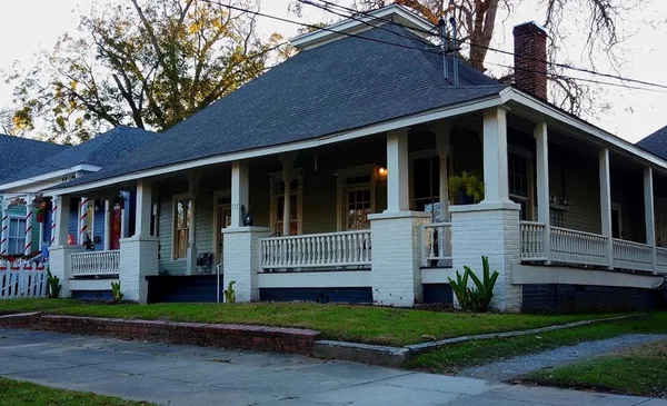 a view of house with a garden