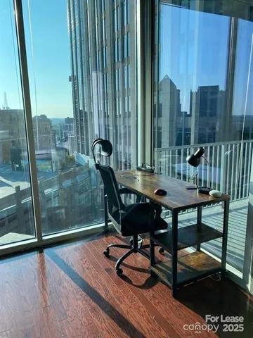 a view of a tables and chairs in patio