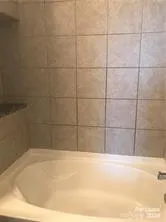 a bathroom with a bathtub