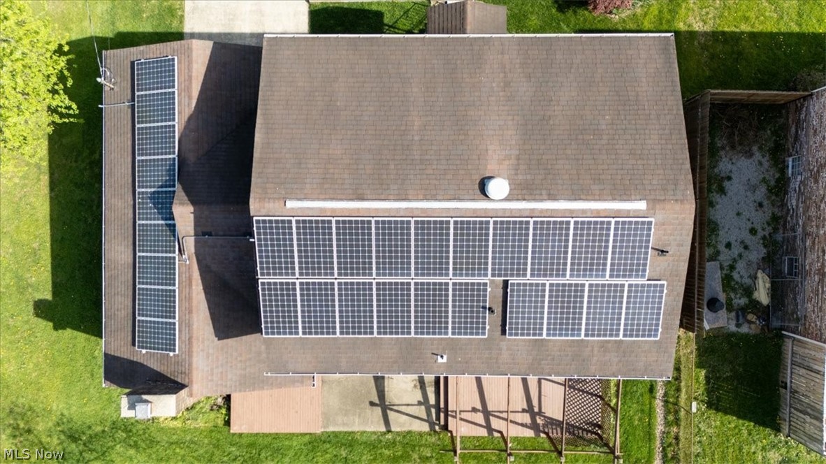 87 Cummins Street Washington, WV 26181 - Photo 43 of 45 eagle eye view showing solar panels on back of roof and garage