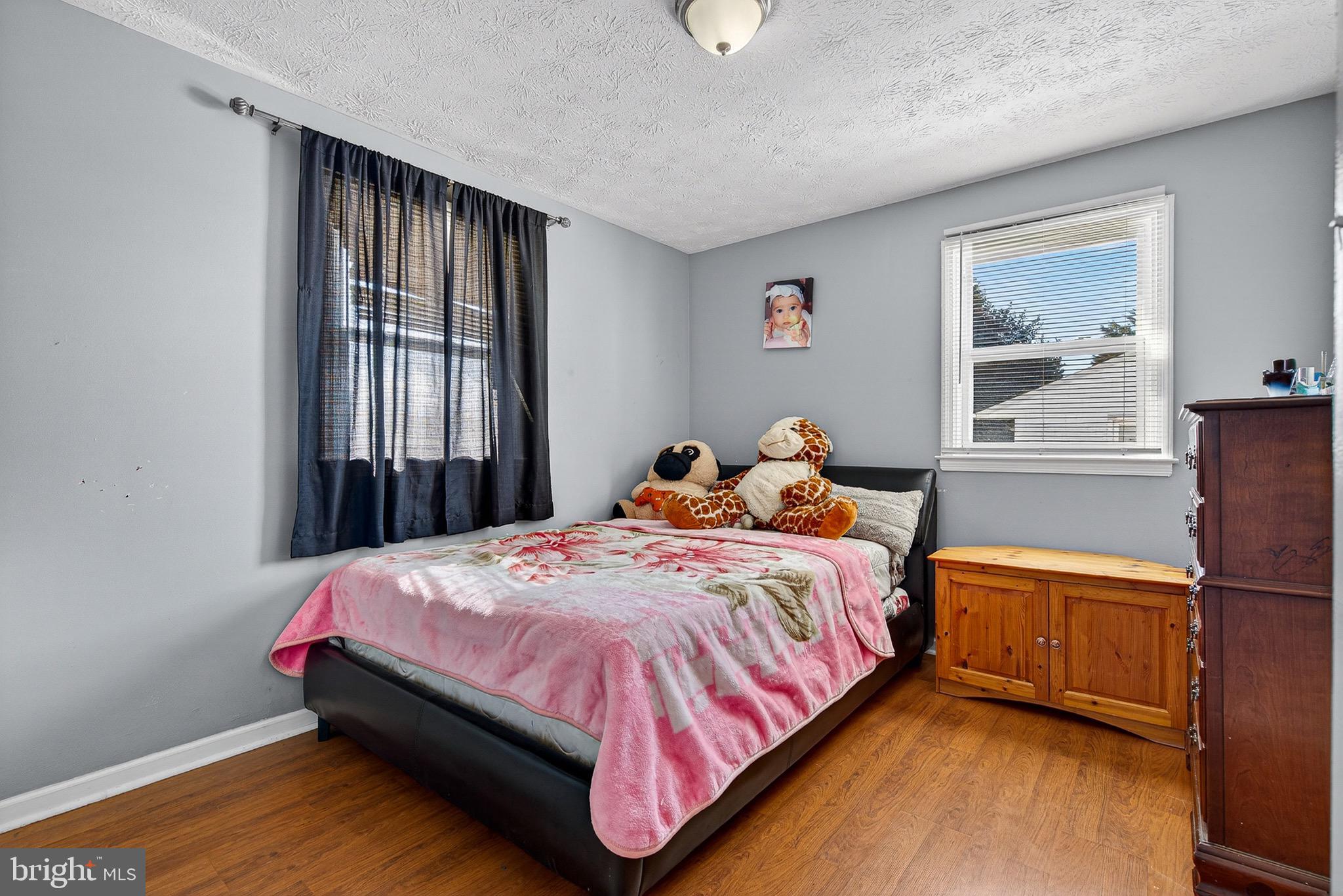 3505 East Joppa Road Parkville, MD 21234 - Photo 12 of 42 a bedroom with a bed and a window