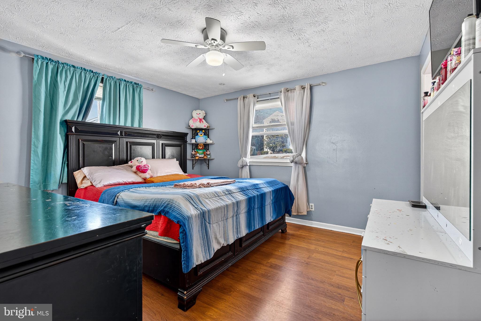 3505 East Joppa Road Parkville, MD 21234 - Photo 14 of 42 a bed room with a bed window and a television