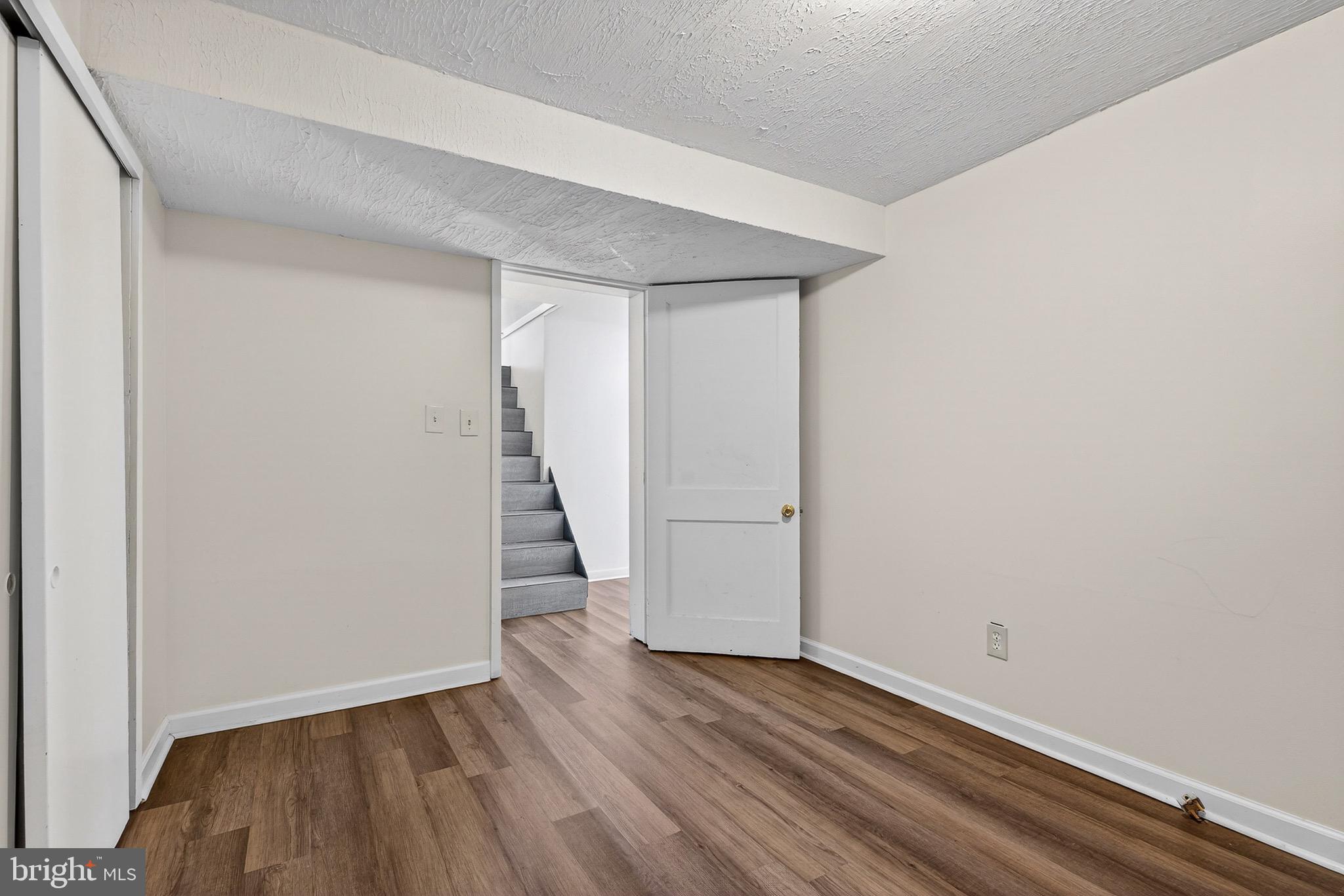 3505 East Joppa Road Parkville, MD 21234 - Photo 23 of 42 a view of an empty room with wooden floor