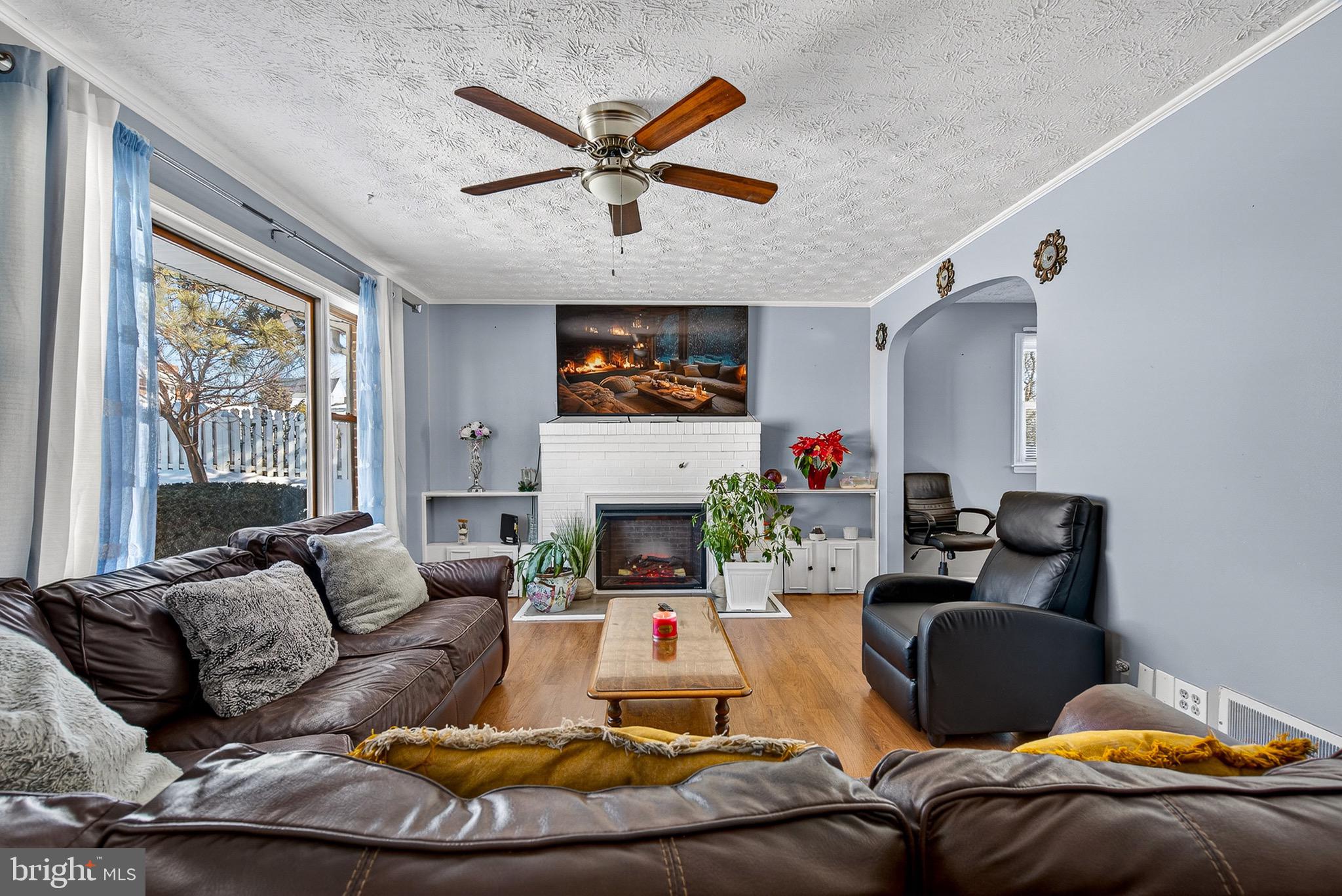 3505 East Joppa Road Parkville, MD 21234 - Photo 3 of 42 a living room with furniture and a fireplace