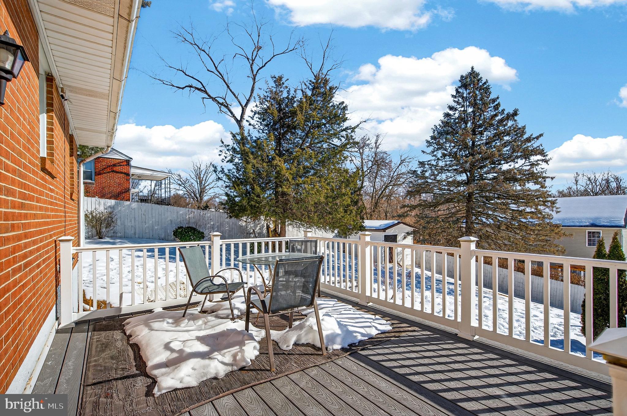 3505 East Joppa Road Parkville, MD 21234 - Photo 32 of 42 a view of a table and chairs on the roof deck