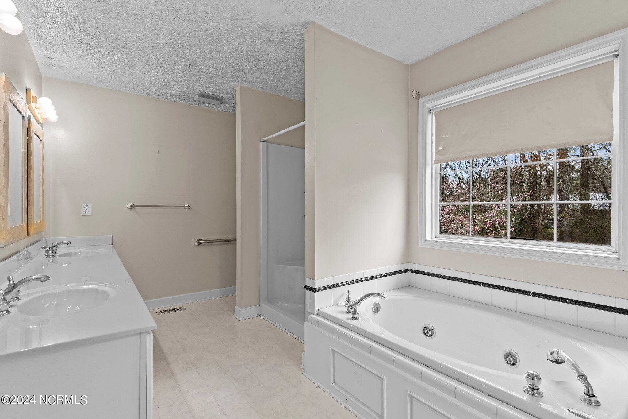 414 Governors Road Southeast Winnabow, NC 28479 - Photo 14 of 31 primary bath 3