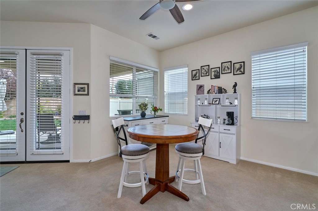 860 Annandale Road Beaumont, CA 92223 - Photo 16 of 61 a dining room with furniture and window