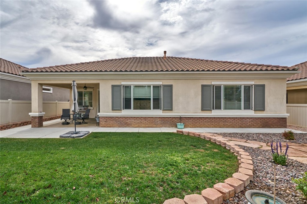 860 Annandale Road Beaumont, CA 92223 - Photo 35 of 61 a view of a house with sitting area and garden