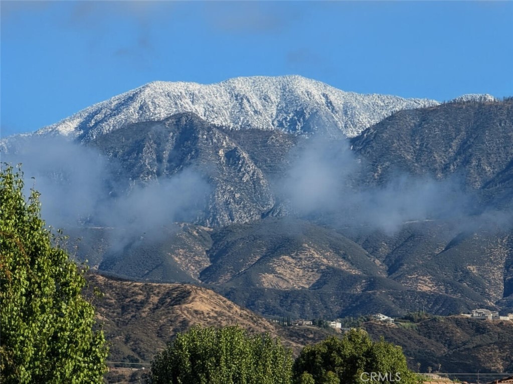 860 Annandale Road Beaumont, CA 92223 - Photo 58 of 61 a view of a fireplace in a field