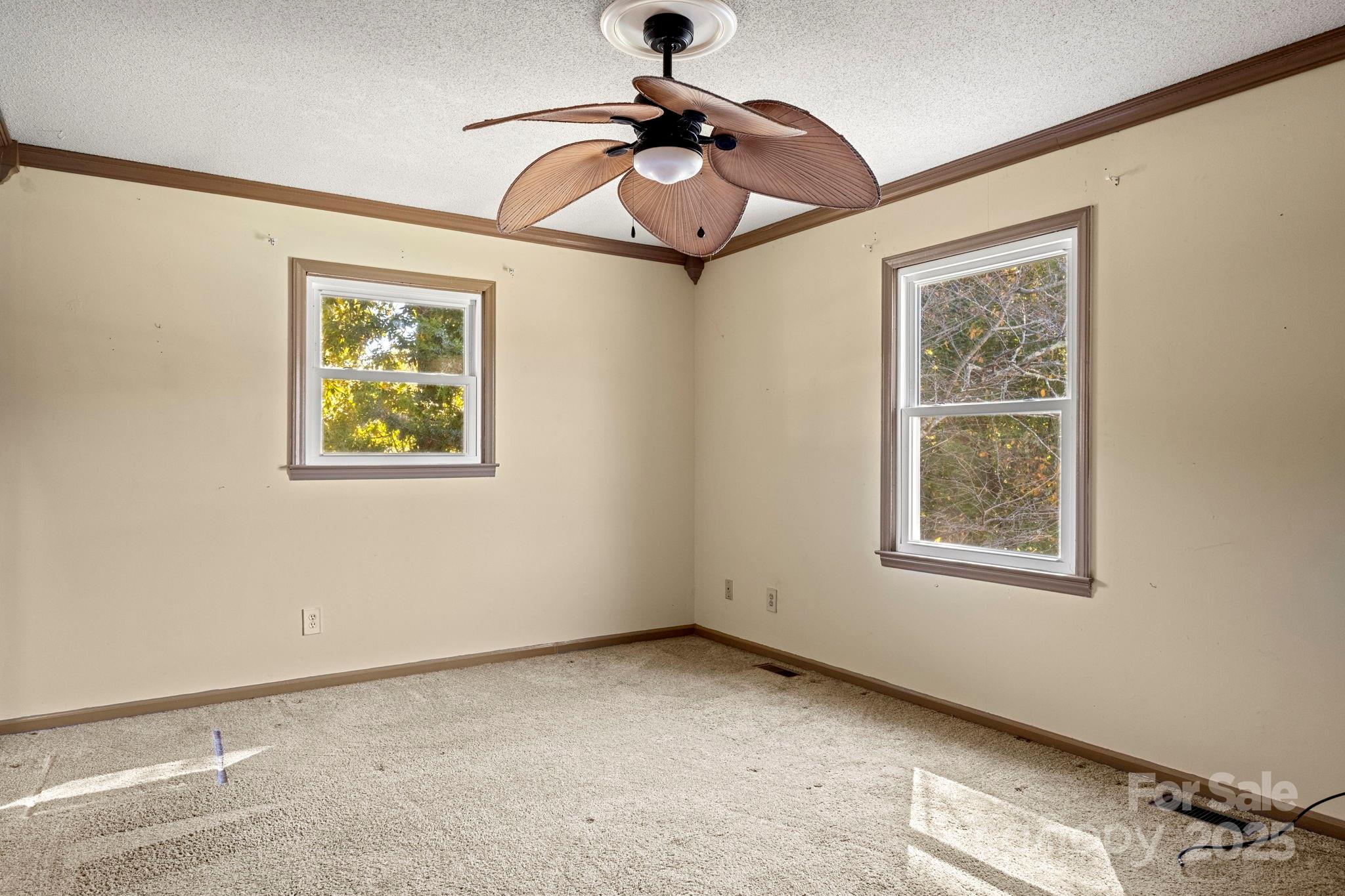 543 Blacksnake Road Stanley, NC 28164 - Photo 13 of 19 a view of an empty room with a window