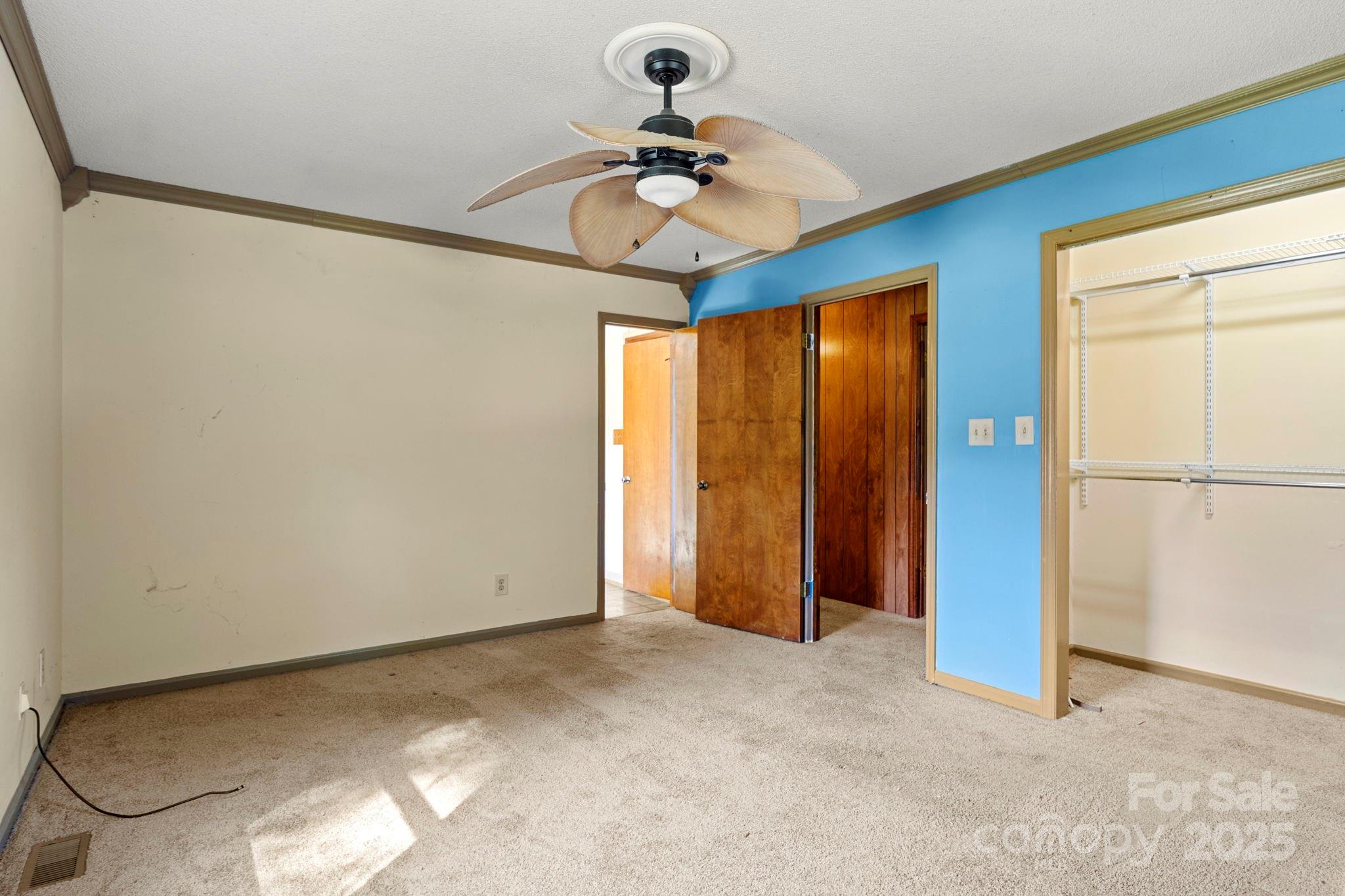 543 Blacksnake Road Stanley, NC 28164 - Photo 14 of 19 a view of entryway with a chandelier fan