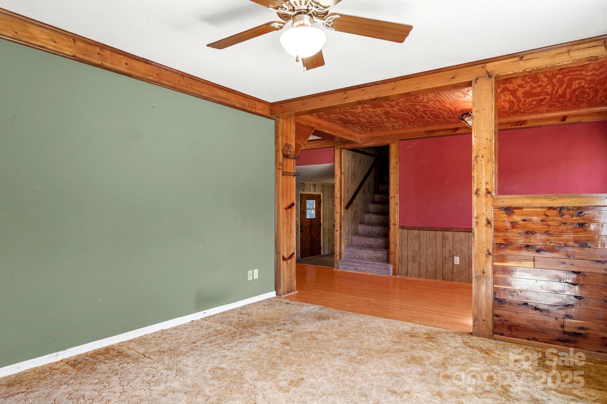 543 Blacksnake Road Stanley, NC 28164 - Photo 5 of 19 a view of a hallway with a chandelier