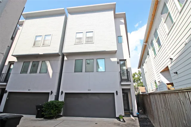 a front view of a house with a garage
