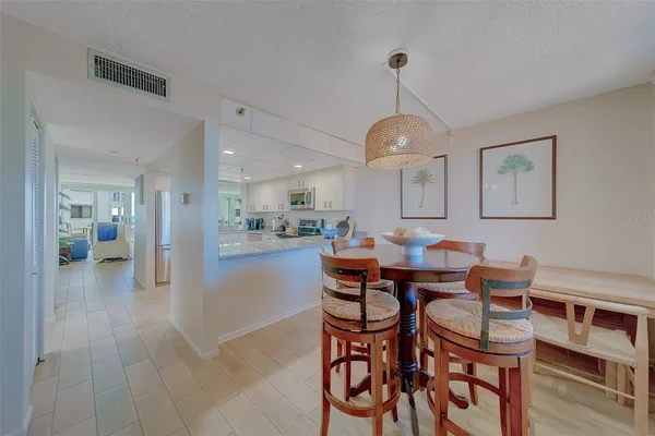 a bed room with a bed and a dresser