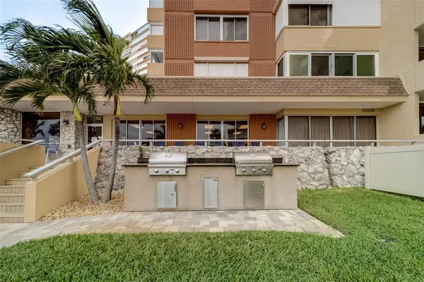 a view of a balcony with chairs