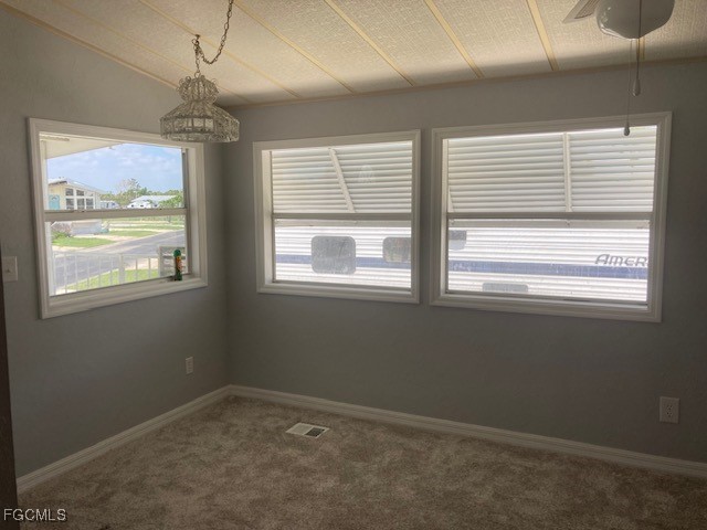 19681 Summerlin Road, Unit J197 Fort Myers, FL 33908 - Photo 13 of 22 a view of an empty room with a window