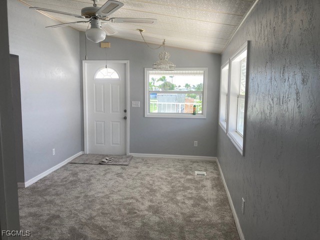 19681 Summerlin Road, Unit J197 Fort Myers, FL 33908 - Photo 15 of 22 an empty room with windows and fan