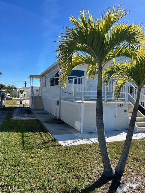 19681 Summerlin Road, Unit J197 Fort Myers, FL 33908 - Photo 22 of 22 a view of outdoor space yard and porch